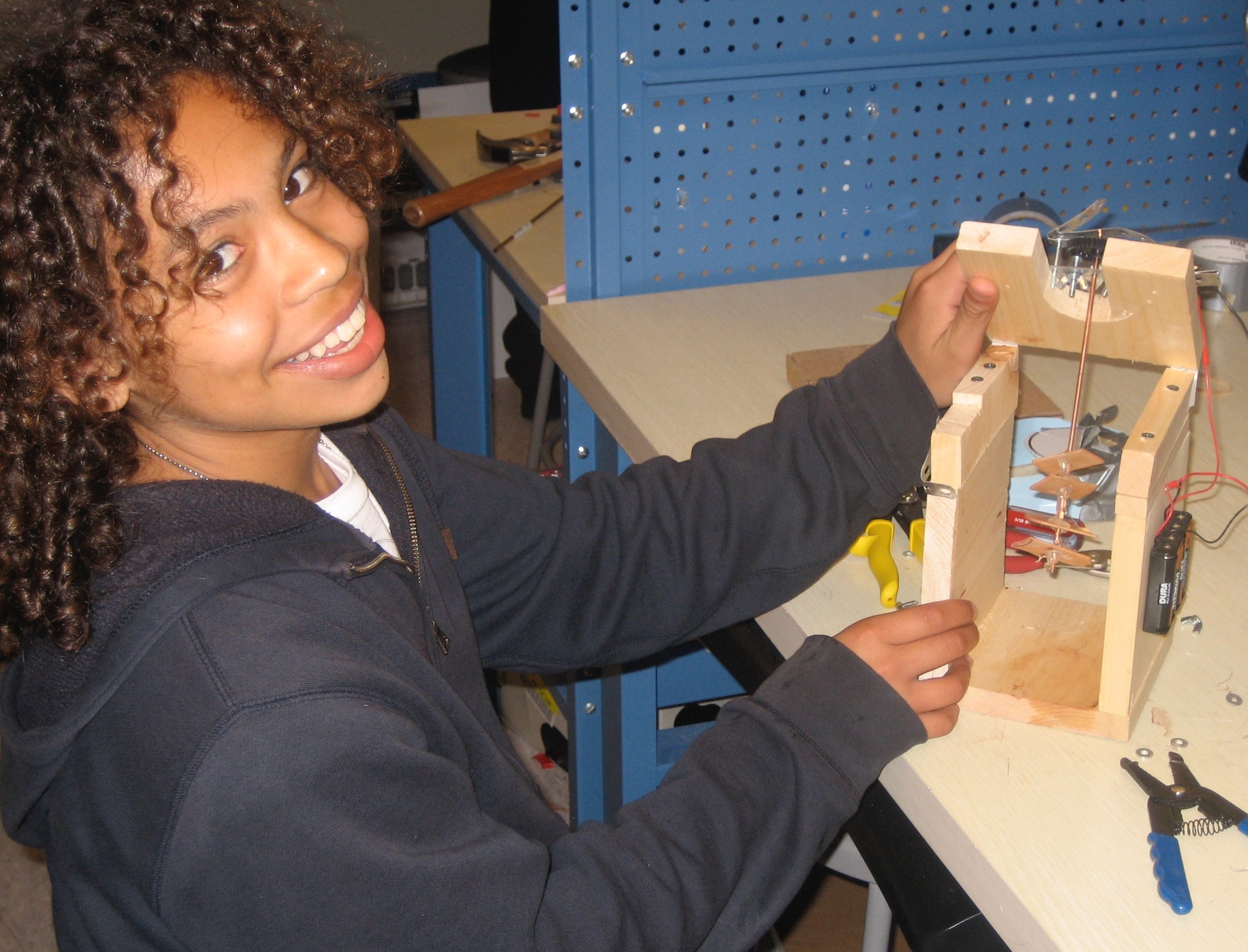 boy showing his electric mixer design